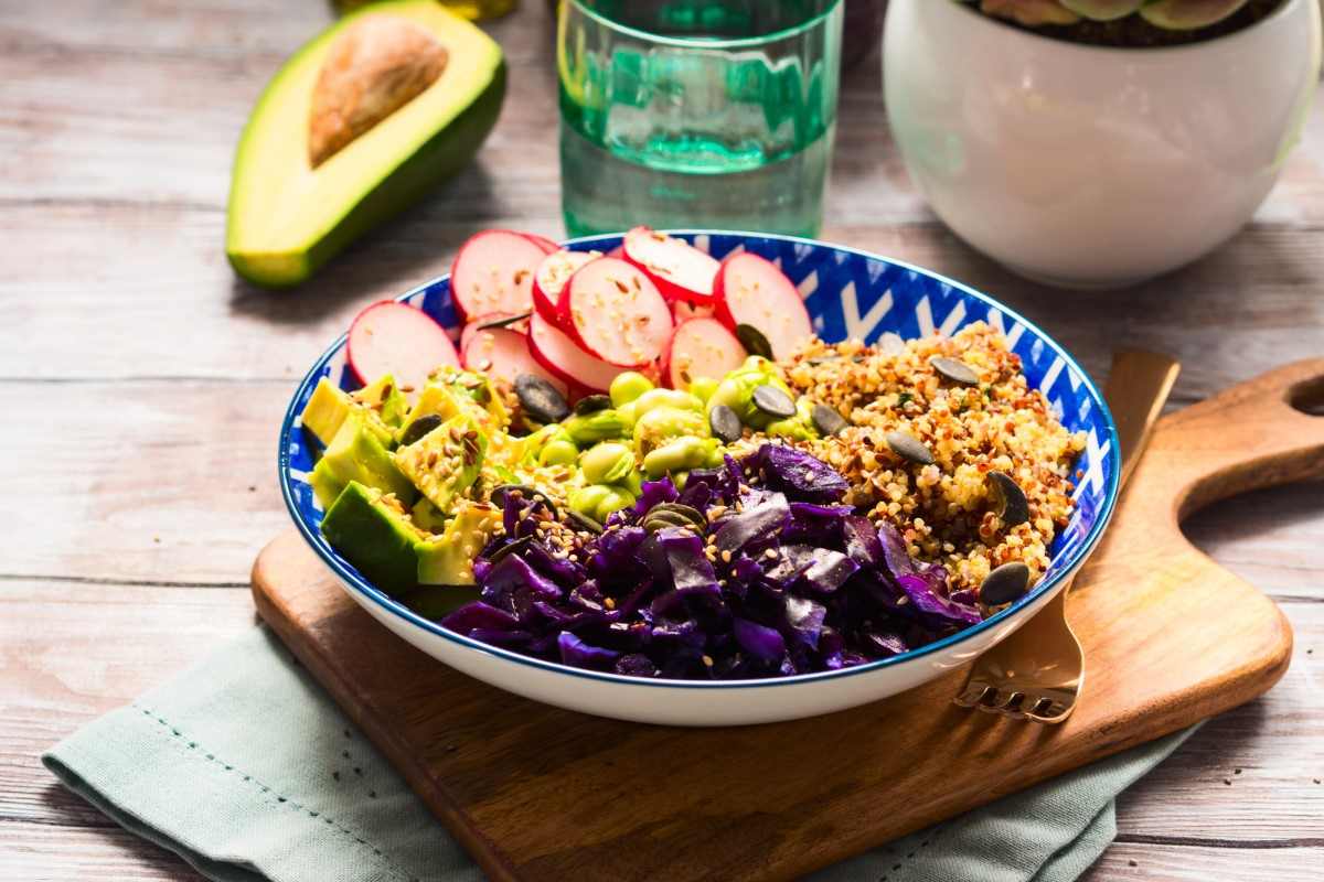 A bowl of veggies and quinoa.