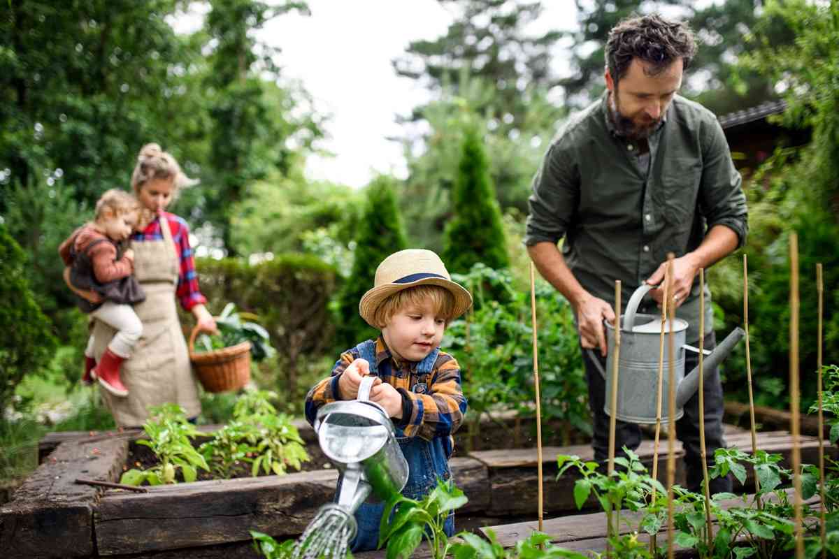 A family gardening: embodying sustainable living.